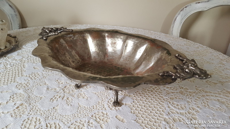 Large, silver-plated fruit basket on legs, offering