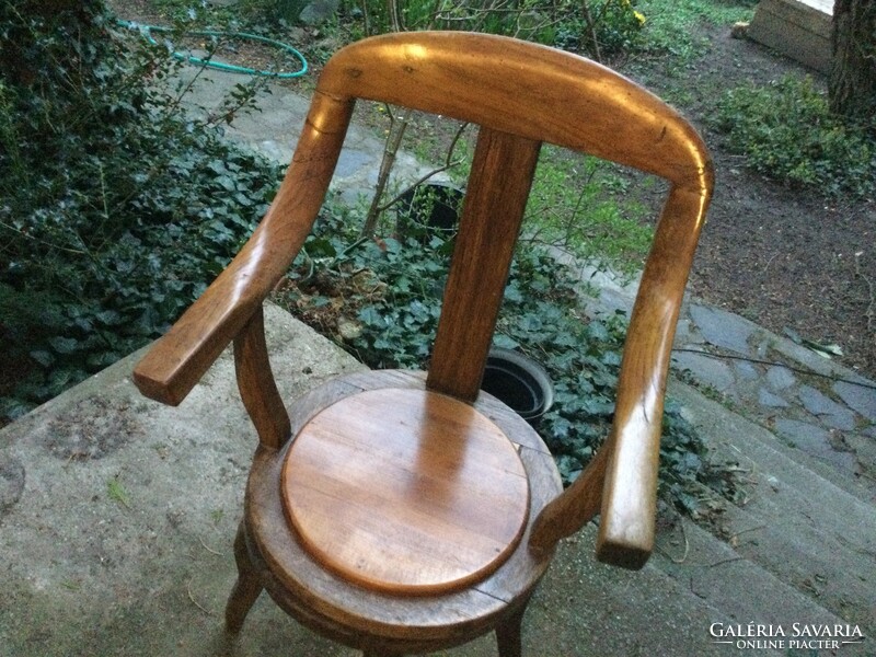 A barber's chair with a simpler shape