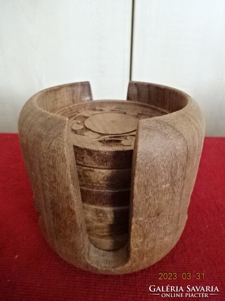 Carved wooden coaster and holder. Jokai.