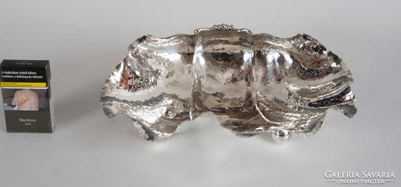 Silver shell-shaped hand-hammered bowl