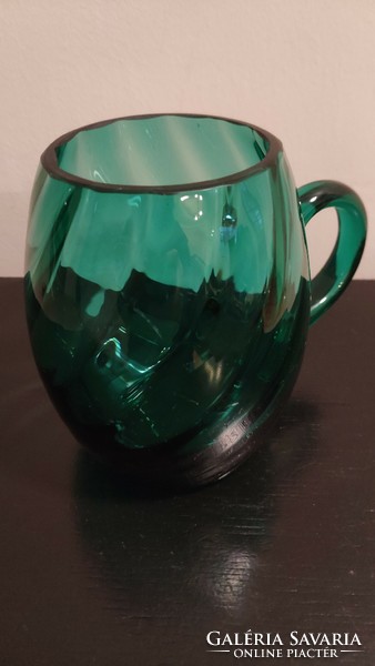 Emerald green glass mug with twisted pattern
