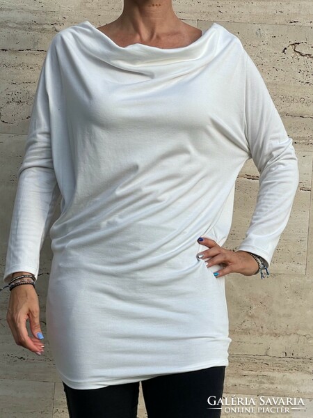White cotton long-sleeved top with a camisole neck and buttons at the back
