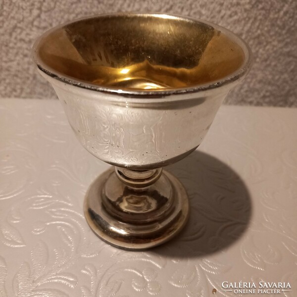 Old, cracked, footed, Huta glass chalice, cup, holy water holder, religious object.
