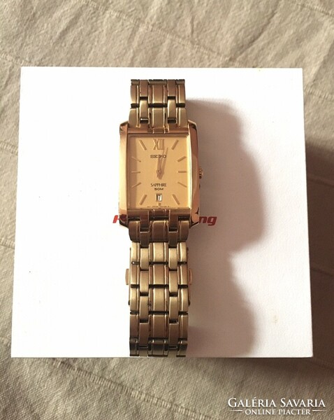 Seiko sapphire gold colored men's quartz wristwatch