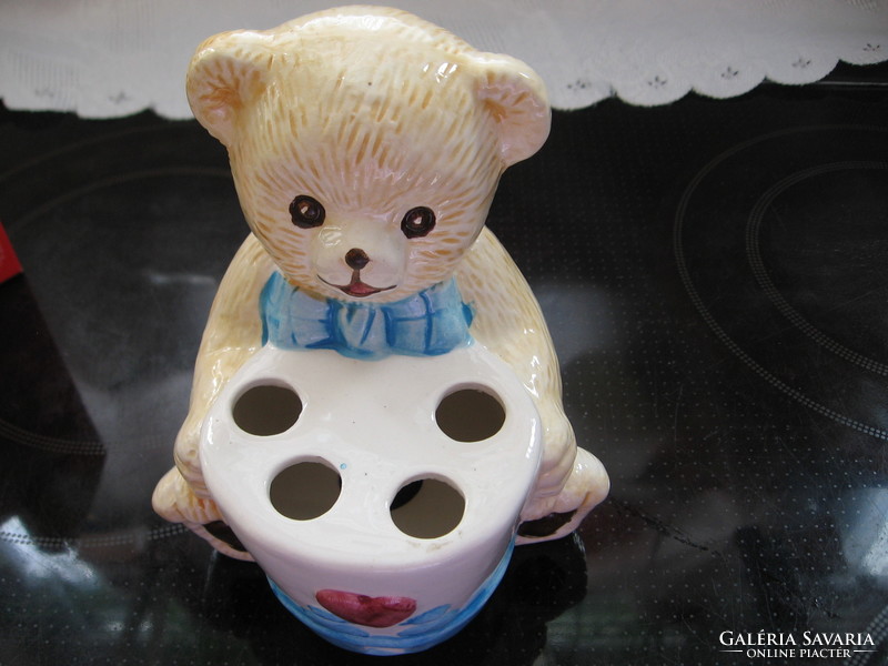 Ceramic teddy bear figurine with toothbrush and pencil holder