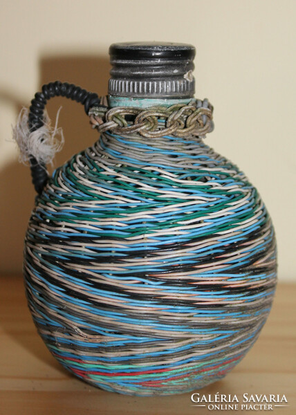 Bottle with blue and white fuse