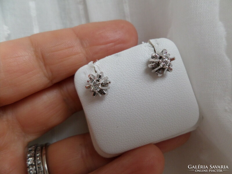 A pair of white gold stud earrings
