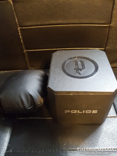 Police watch box on black.