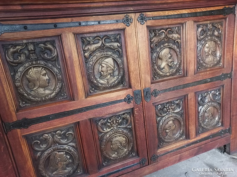 Antique unique figurally decorated renaissance style cabinet