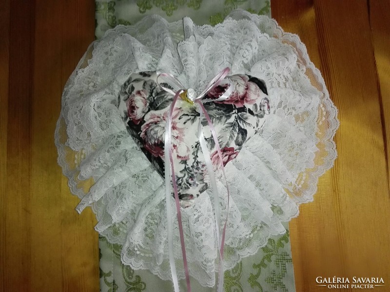 Romantic sheer lace heart pillow.