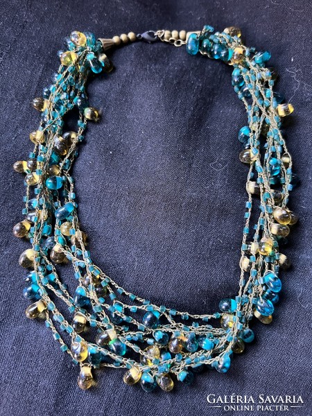 Necklace with blue and brown pearls strung in several rows, bijou