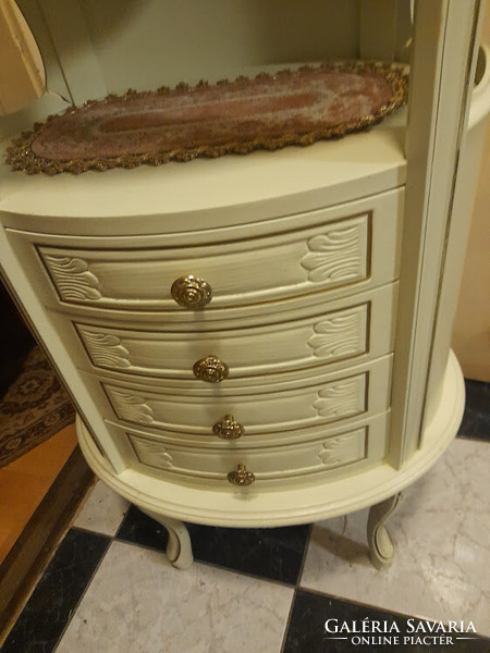 Oval white baroque chest of drawers
