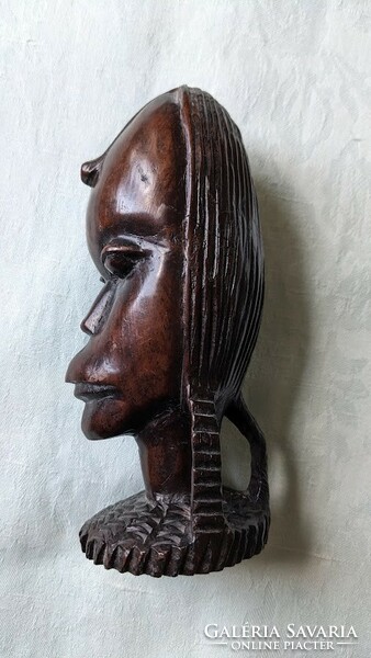 Female head African wood sculpture