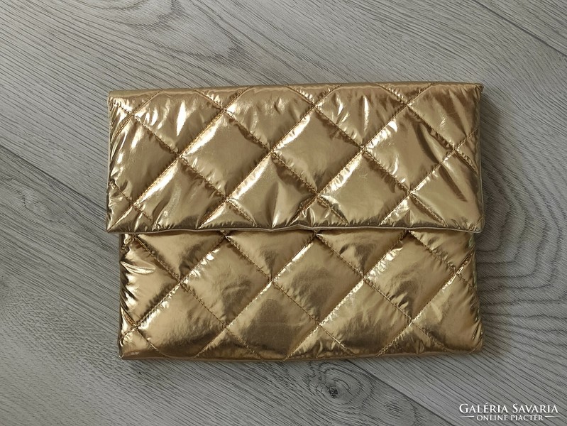 Gold quilted patent pouffe handbag