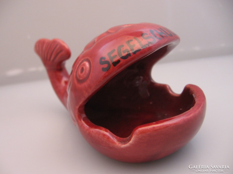 Retro burgundy fish-shaped ashtray with open mouth, ring holder