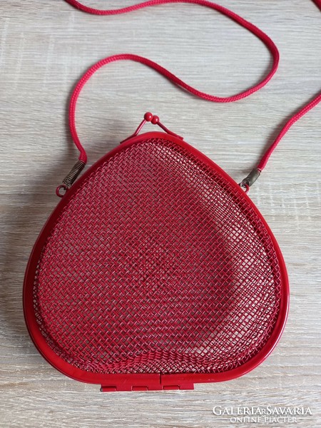Retro heart shaped red metal bag