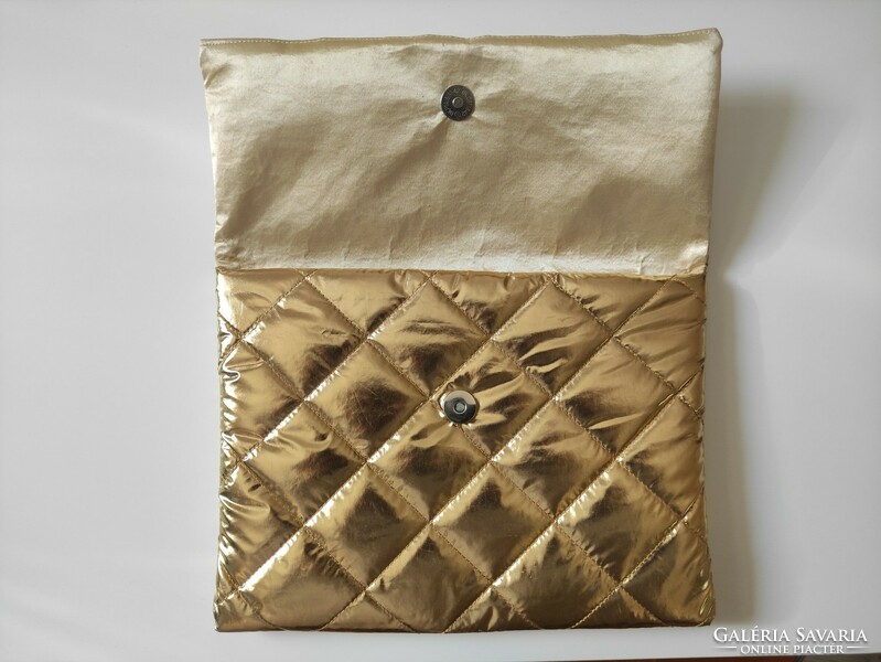Gold quilted patent pouffe handbag