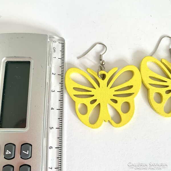 Vintage earrings with a butterfly hook, the jewelry comes from the 1980s
