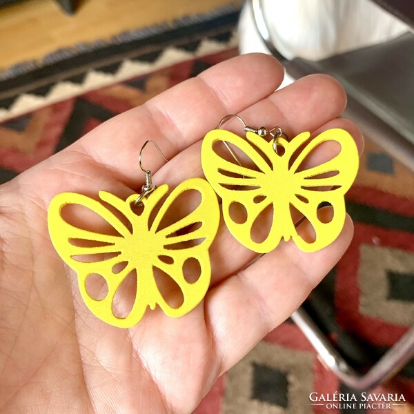 Vintage earrings with a butterfly hook, the jewelry comes from the 1980s