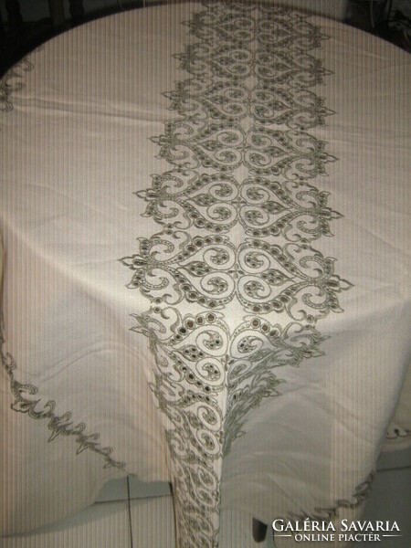 A woven tablecloth embroidered in a beautiful and elegant material