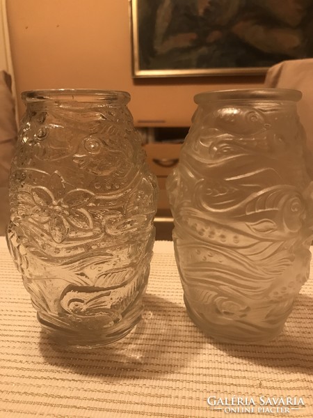A pair of glass vases with a sea pattern
