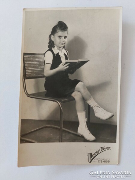 Old children's photo of a little girl, smile album, 1949
