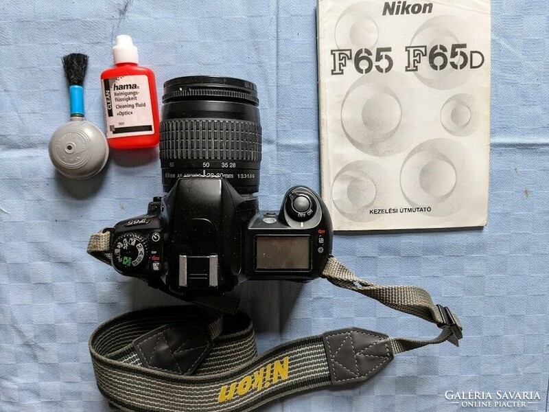 Nikon f65 SLR camera (film) with af nikkor 28-80 mm 1:3.3-5.6g lens