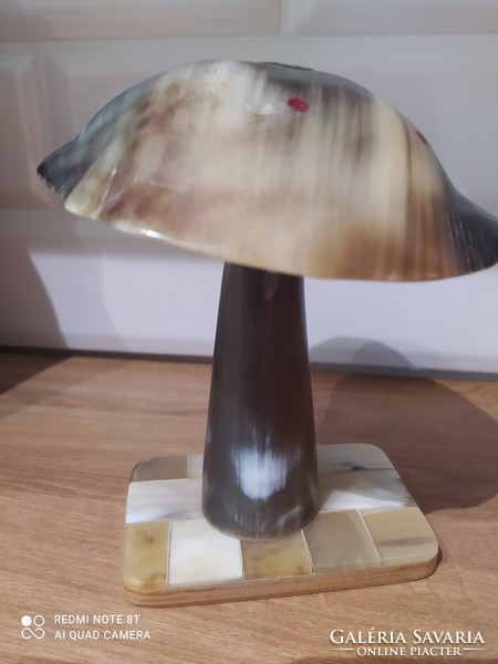 An ornament made of horn - a mushroom