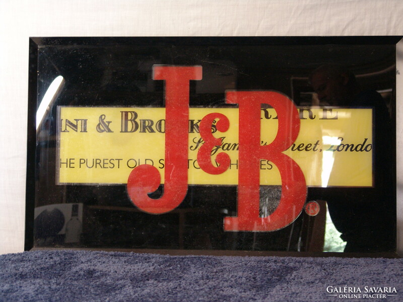 Old illuminated j b whiskey drink advertisement