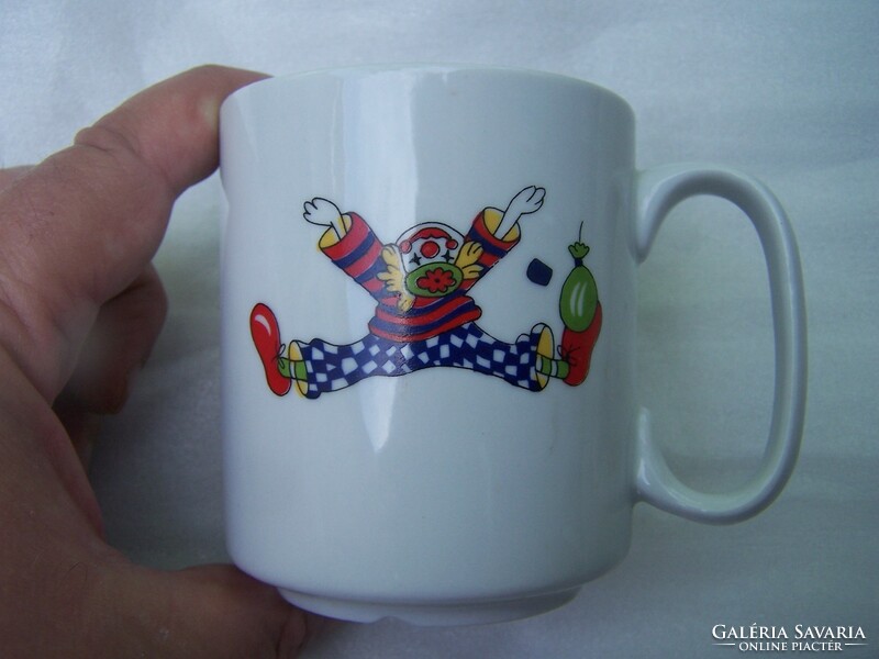 Mug marked with a clown figure, flawless. Its height is 9 cm. Nice piece