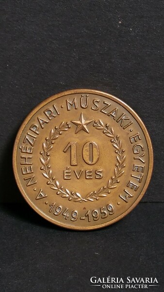 The commemorative medal of the Technical University of Heavy Industry is 10 years old