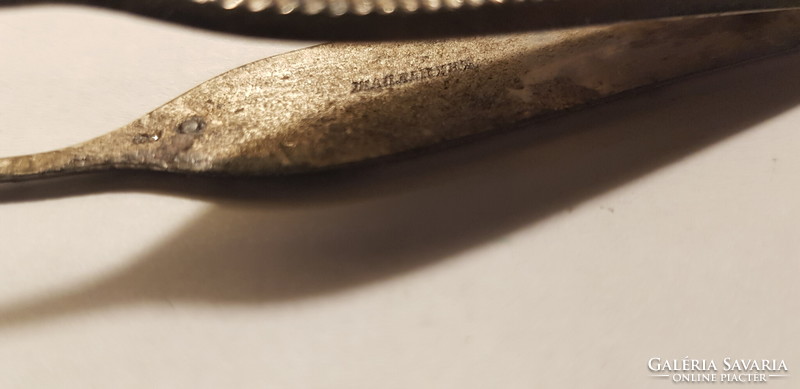 Antique metal tweezers, tool