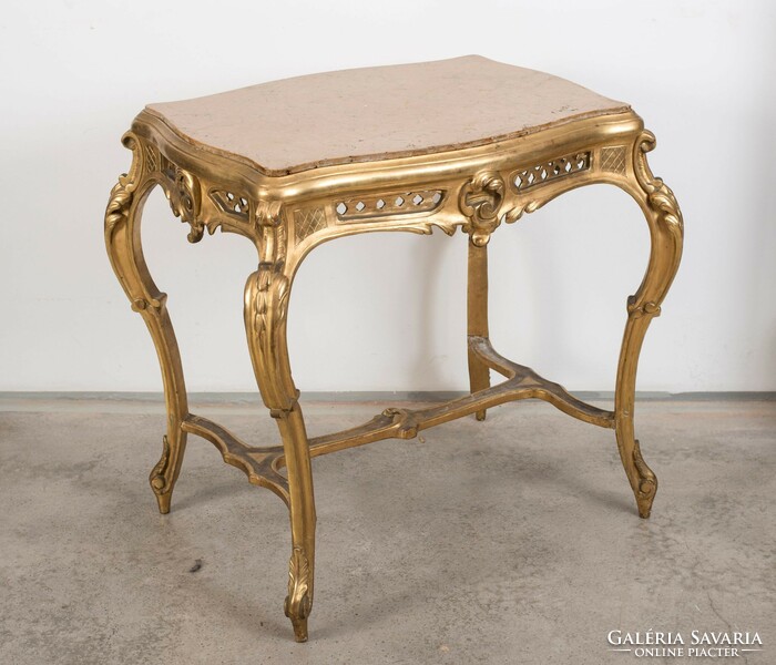 Baroque style table with marble top