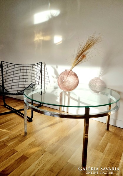 Mid-century round coffee table with metal frame, glass table