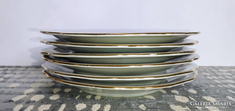 Six gold-edged floral Zsolnay cookie plates