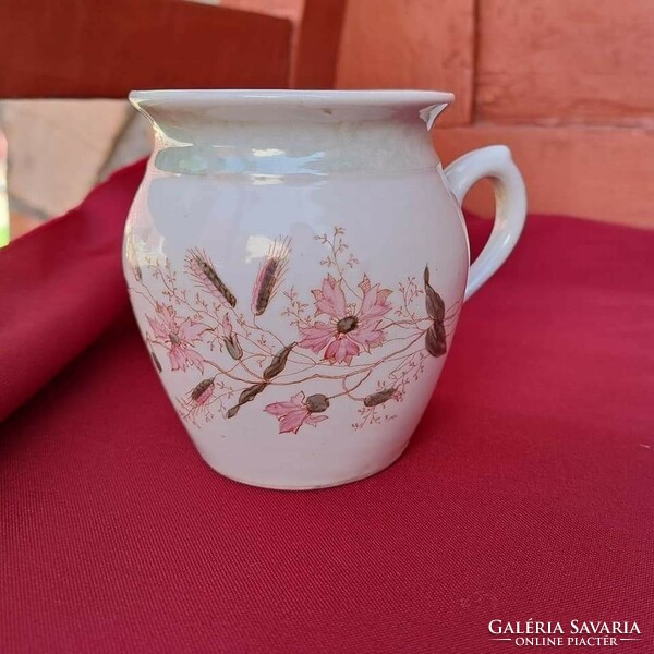 Porcelain mug with flowered porcelain