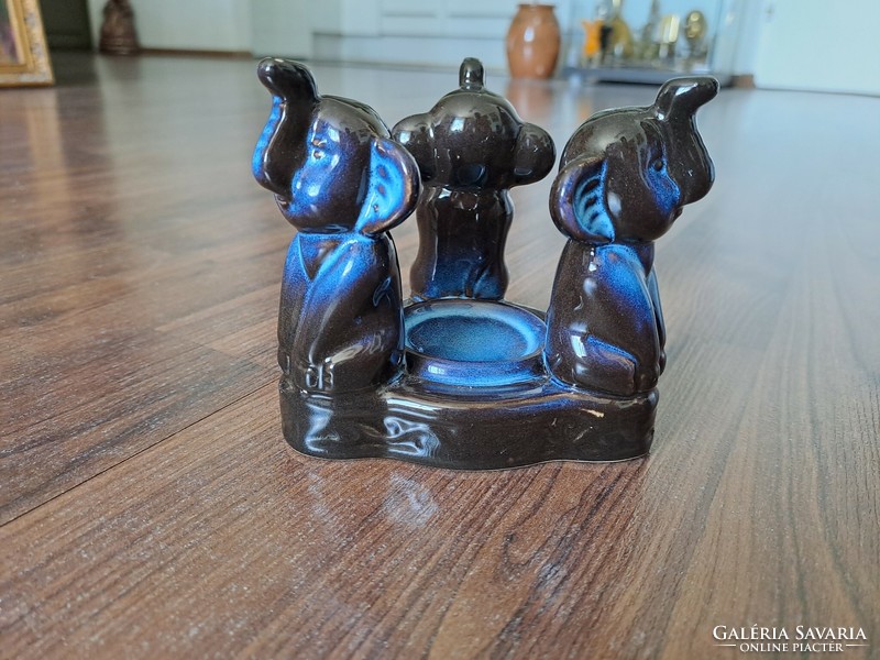Ceramic candle holder with elephants