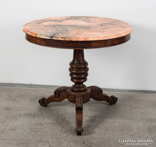 Round table with pink marble top