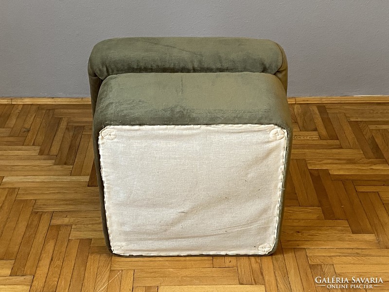 Green-colored pouffe seat in a well-preserved condition with a classic shape