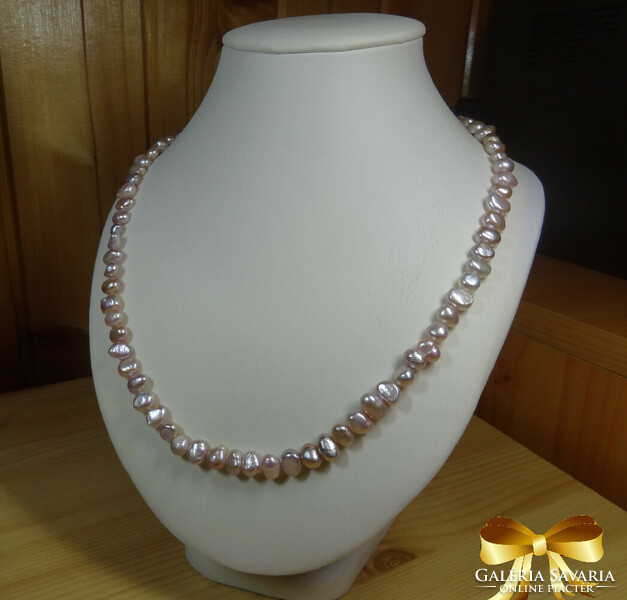 Cultured true pearls are a rarity in this form. The shine is wonderful.