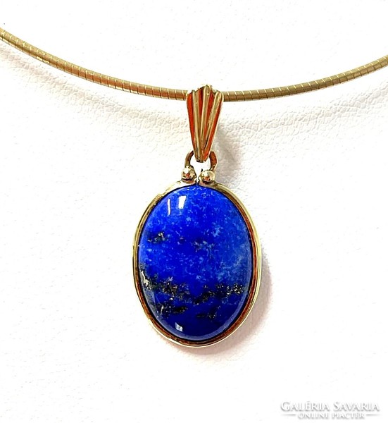 Lapis lazuli stone pendant in a gold frame