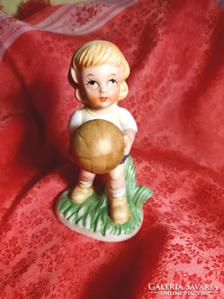 Small child with a ball, porcelain nipp