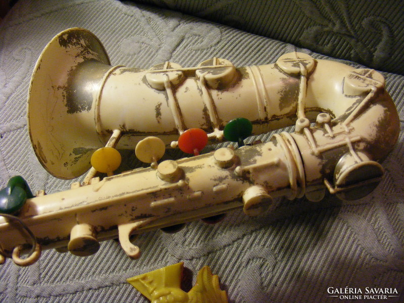 Retro Russian plastic toy saxophone and mini cocked bagpipes