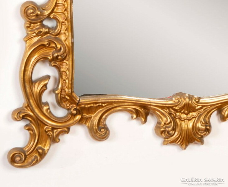 Gilded carved wooden console mirror