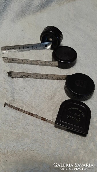 Old measuring tapes with vinyl casing