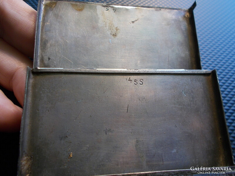 Silver-plated alpaca cigarette holder box, with markings. 14X8 cm