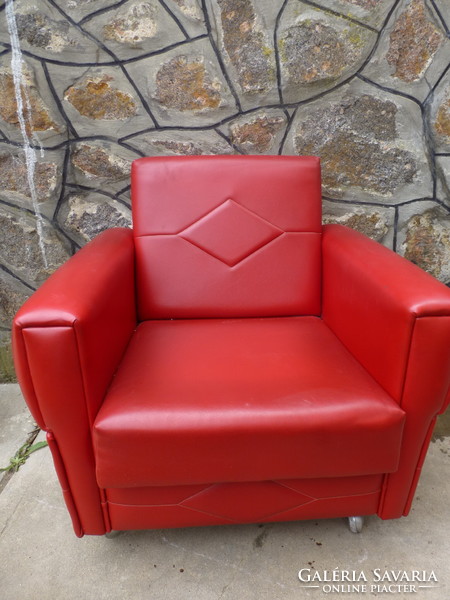 Beautiful red, art deco rolling armchair ii.