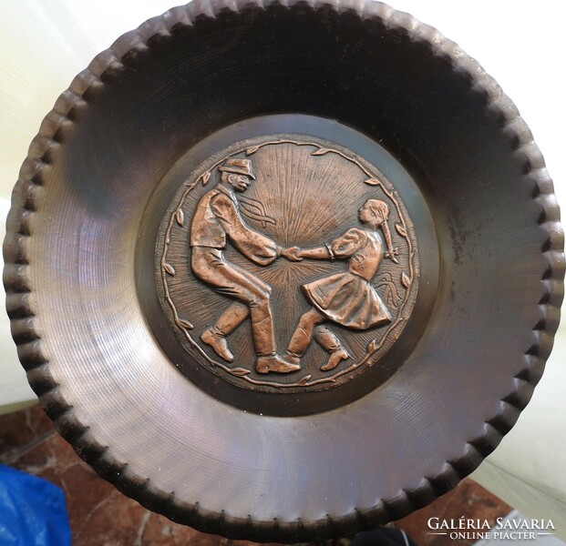 Bronzed iron wall plate - wall plate - with a folk dance pattern