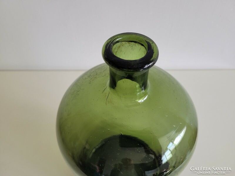 Old large size 6 liter olive green huta glass glass bottle conical bottom balloon bottle