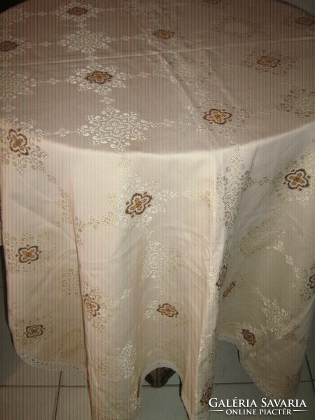 A wonderful festive handmade intricately embroidered damask tablecloth